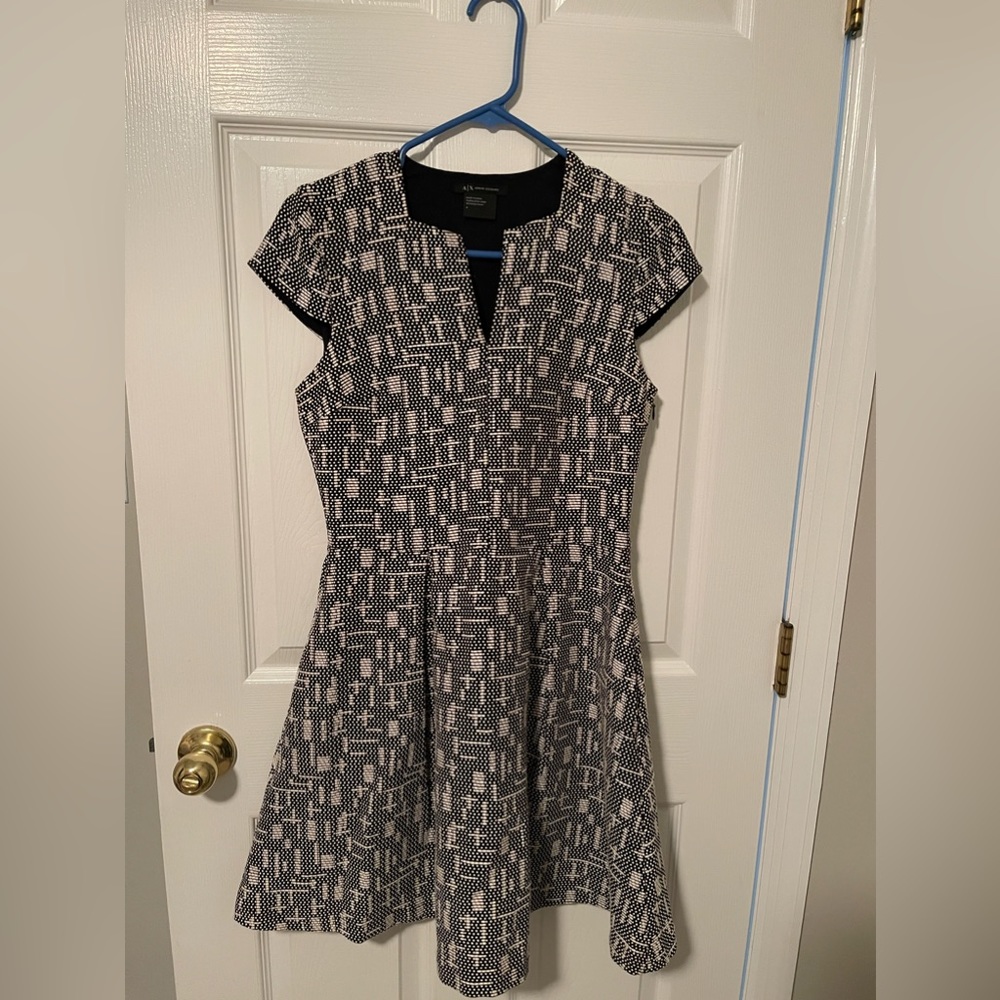 Jacket  is size 6,dresses is size 4